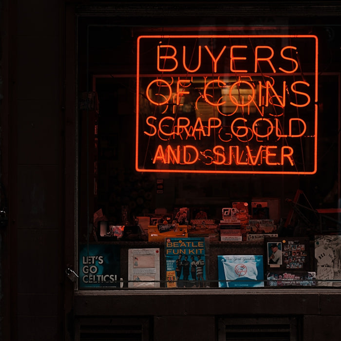 orange buyers of coins scrap gold and silver neon signage