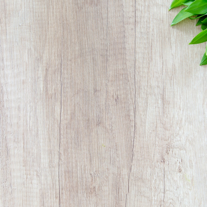 green leafed vegetable on brown wooden surface