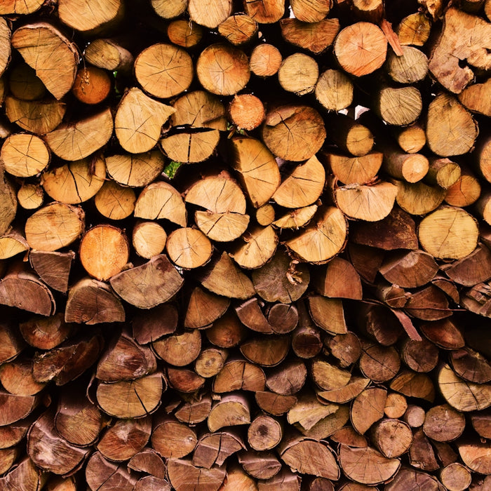 stack of firewood at daytime