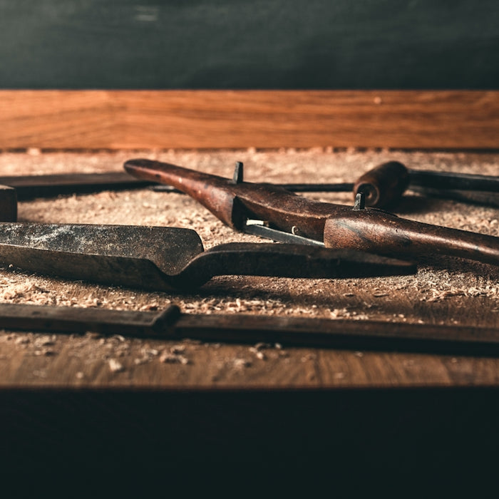 black hammer on brown wood