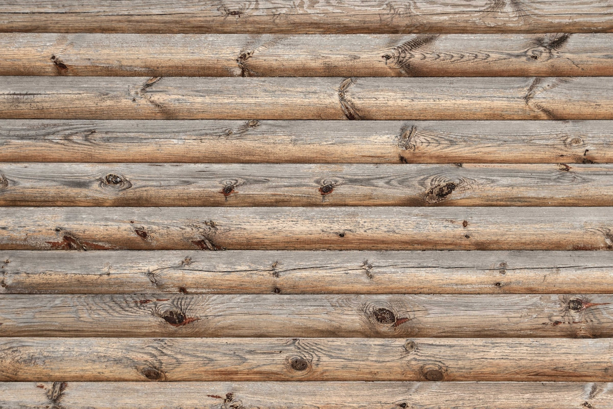 a close up of a wooden wall made of logs