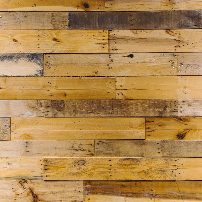 a close up of a wall made of wood planks