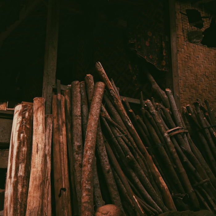 brown wooden sticks on brown wooden plank
