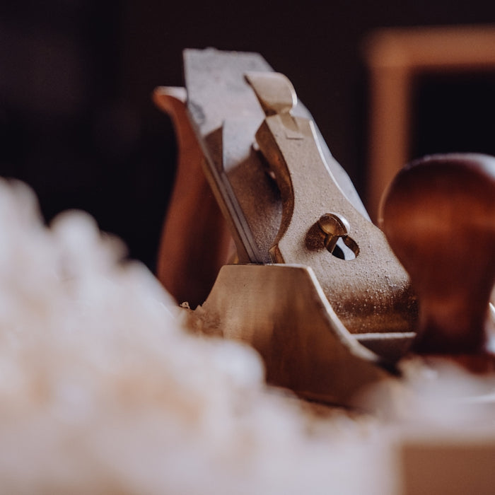 a close up of a wooden object on a table