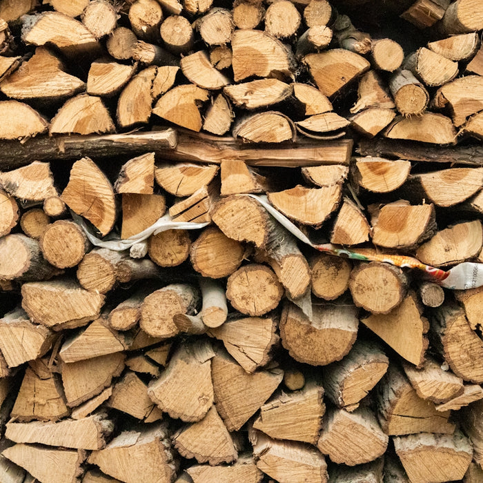 a pile of cut wood is shown in this image
