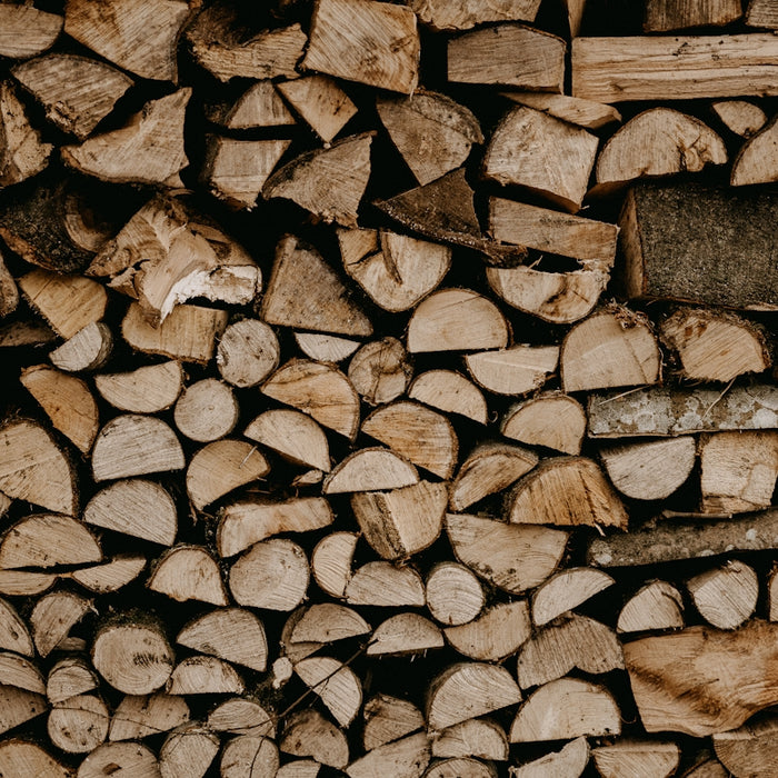 a pile of wood that is stacked up