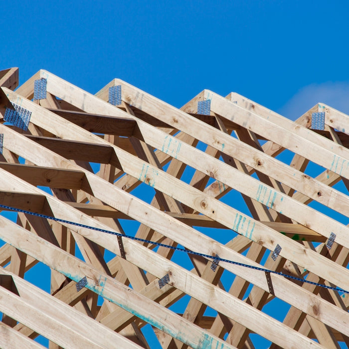 a wooden structure with a sky background