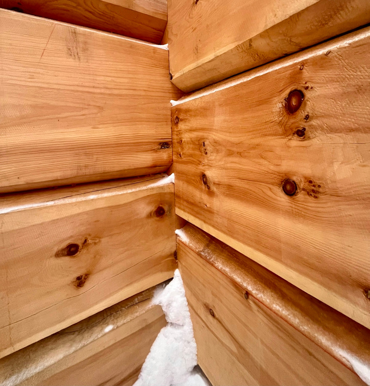 a close up of a pile of wood
