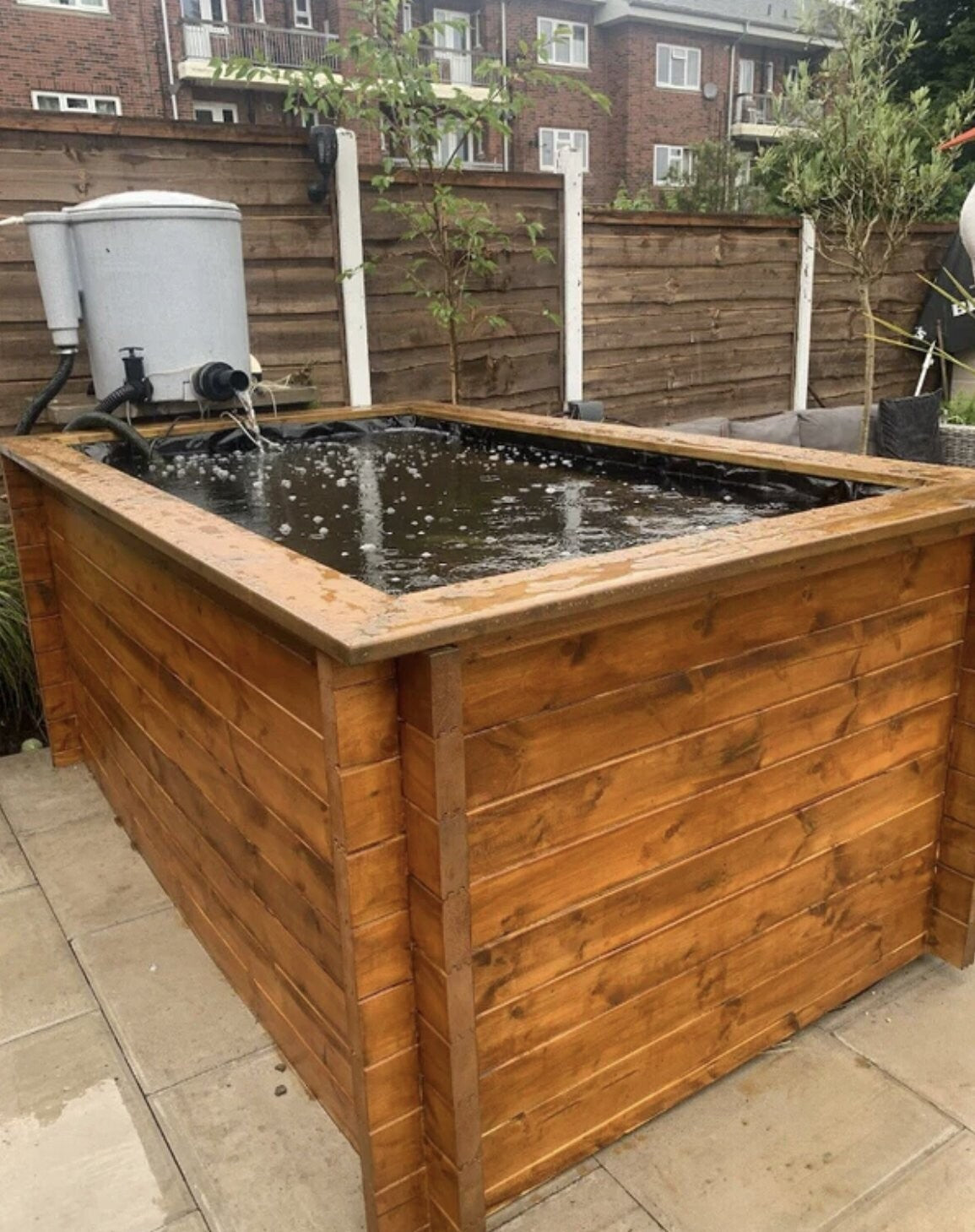 raised garden pond made from timber wood
