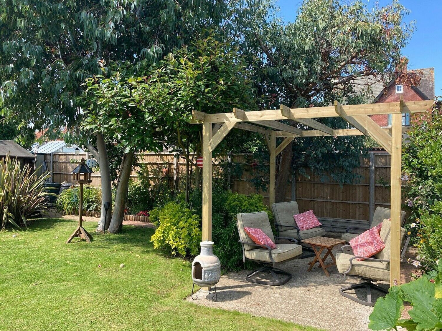 Timber DIY Pergola, in a garden on a summers day
